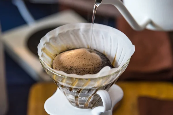 Close up of filter coffee maker, kettle with thermometer and dig