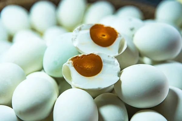 Salted duck eggs for sale in the fresh market, Yolk of salted eggs