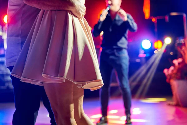 couple dancing slow dance in a nightclub