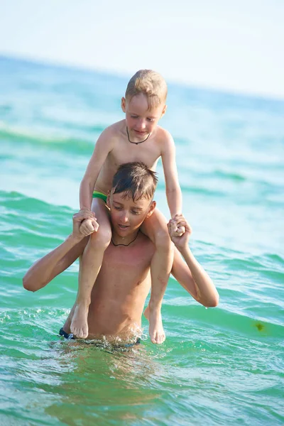 Two Boys Brother Play Water Two Boys Brother Play Water Royalty Free Stock Images