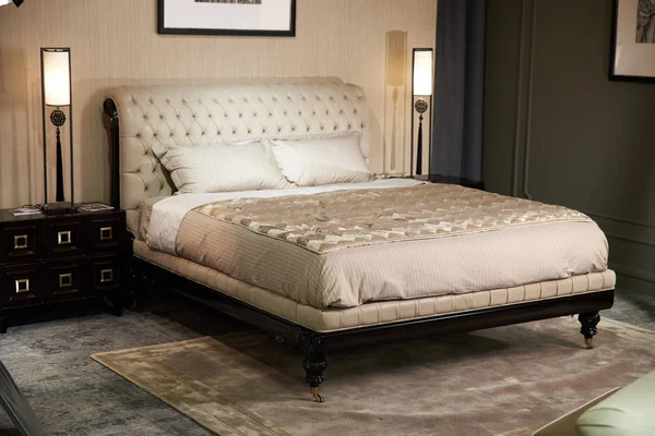 luxury double bed leather back with pillows powder colorin the bedroom