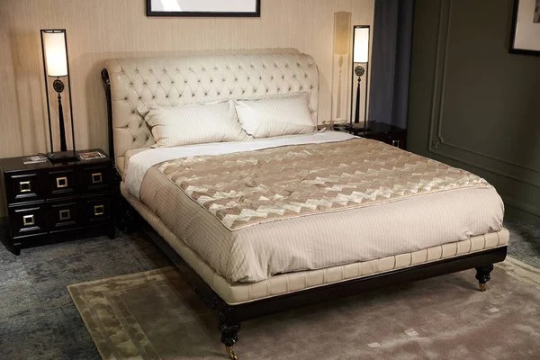 luxury double bed leather back with pillows powder colorin the bedroom