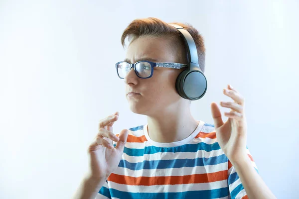 Funny Boy Teenager Listens Music Headphones Dances — Stock Photo, Image