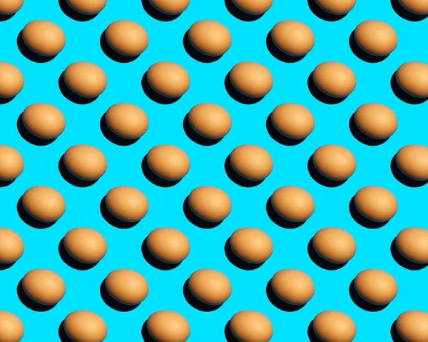 Egg pattern on blue background