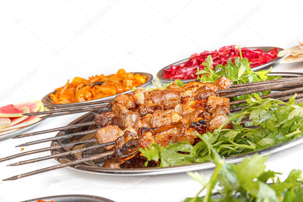 Turkish Sis Kebab isolated white background. Turkish kebab is one of the most beautiful dishes. Mince pita, cheese pide, mixed pita, diced pita
