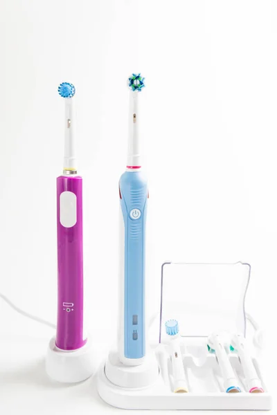 Electric Rechargeable Toothbrushes Family Light Background — Stock Photo, Image
