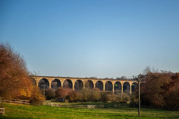 Hidden gem in Wales during Autumn - Ty Mawr Country Park. Trails are running beneath the Cefn Viaduct, past the banks of the River Dee and along the Cefn Heritage Trail, Wales, UK