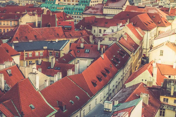 View on Prague panorama with red roofs and historic architecture from staromestska radnice, Old Town Hall, Czech Republic