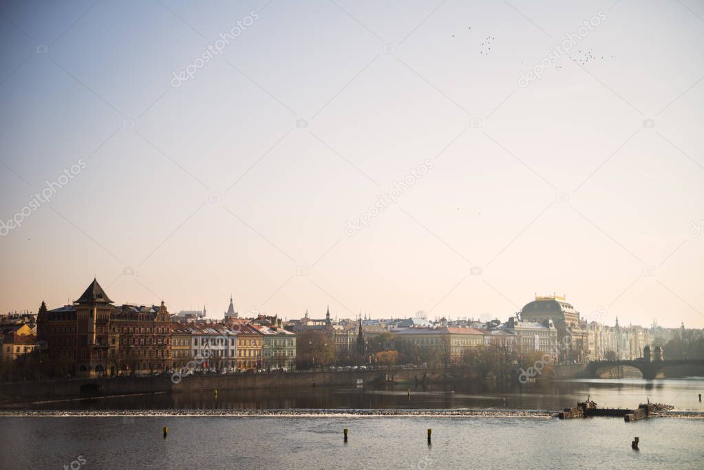 View for embankment of the Vltava River from Karlov most, Charles bridge, in a sunny day, Prague, Czech Republic