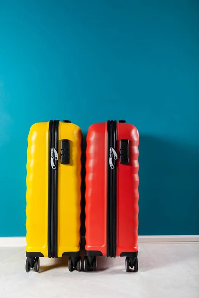 Bright cabin size suitcases as holiday concept