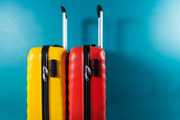 Bright cabin size suitcases as holiday concept