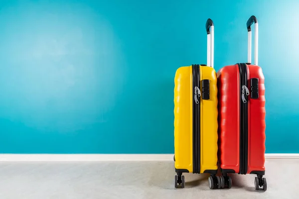 Bright cabin size suitcases as holiday concept