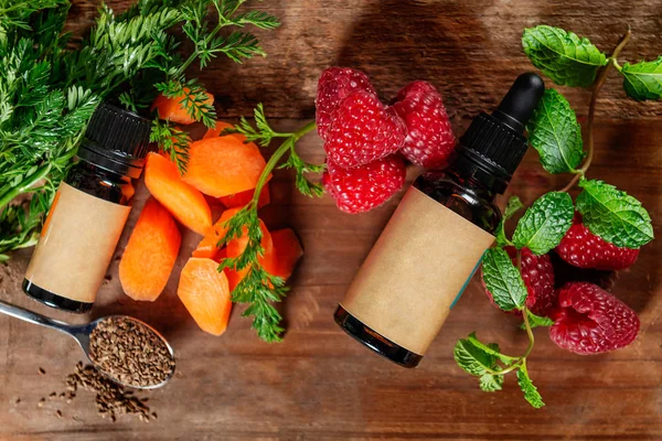 Carrot and Raspberry Seed Oil. Pure, Natural. Aromatherapy, Massage Base Oil, Sunscreen — Stock Photo, Image