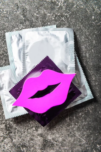 Condom and lips from photo booth props — Stock Photo, Image