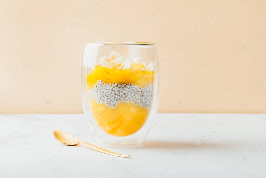 Homemade 4 Ingredient Mango Chia Pudding made with Almond or Coconut Milk in the Double Wall Glass Cups
