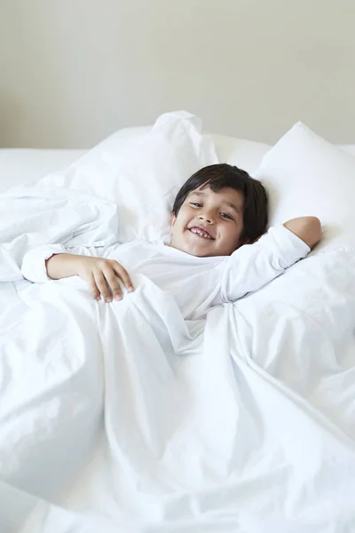 Smiling Boy Bed Looking Camera — Stock Photo, Image