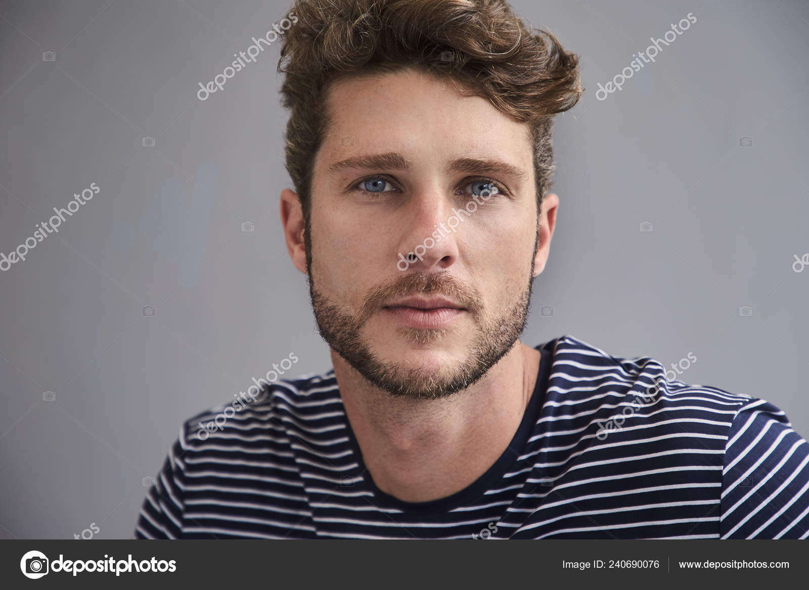 Premium Photo  Portrait of young attractive man with blue eyes