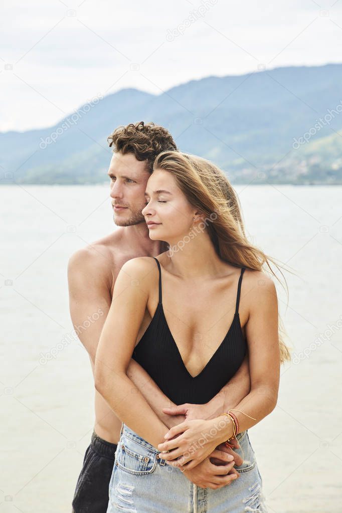 Loving young couple on beach