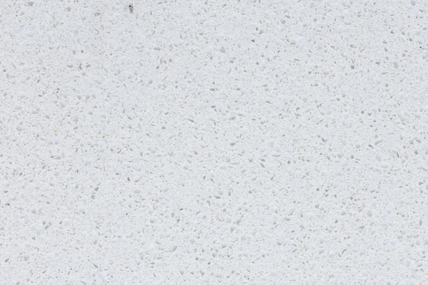 Beyaz renkte taze yüzey sentetik taş. Yüksek çözünürlüklü fotoğraf.