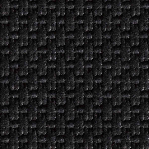 Extraordinary black paper texture with contrast uneven surface. Seamless square background, tile ready. High resolution photo.