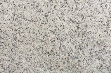Doğal granit arka plan beyaz renktedir. Yüksek çözünürlüklü fotoğraf.