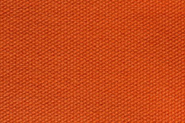 Korku veren Tekstil arka planda parlak turuncu renk. Yüksek çözünürlüklü fotoğraf.