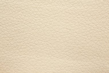 Gentle beige leatherette background. High resolution photo. clipart