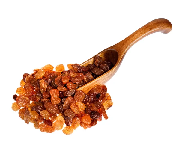 Raisins nel cucchiaio di legno, isolato su sfondo bianco . — Foto Stock