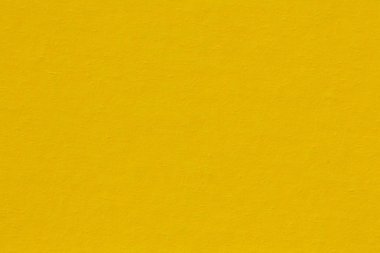 Sarı kağıt arkaplan, makro üzerinde renkli kağıt dokusu.