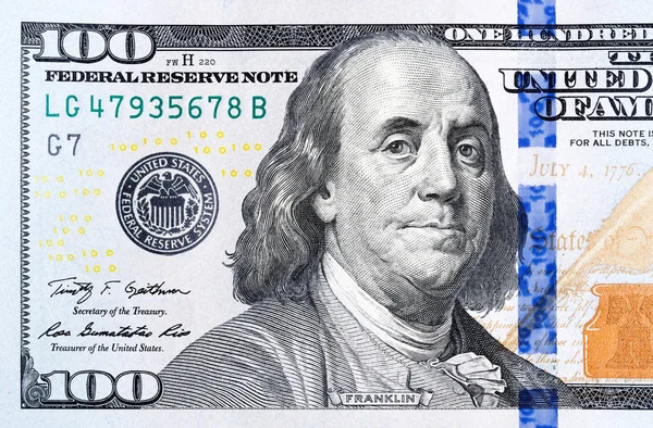 Close up part of new hundred dollar bill. — Stock Photo, Image