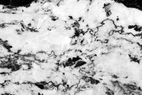 Abstract black and white granite texture on macro. Beautiful natural stone background.