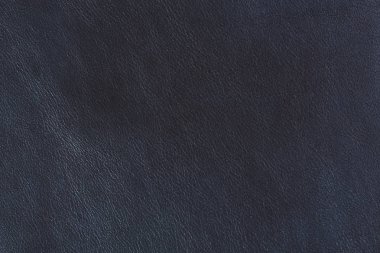 Koyu mavi deri, soyut arka plan. Makro üzerinde mavi deri doku.