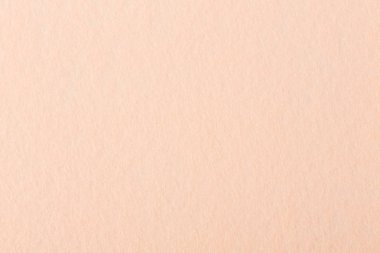 Yumuşak pembe keçe arka plan yakın çekim. Keçe doku.