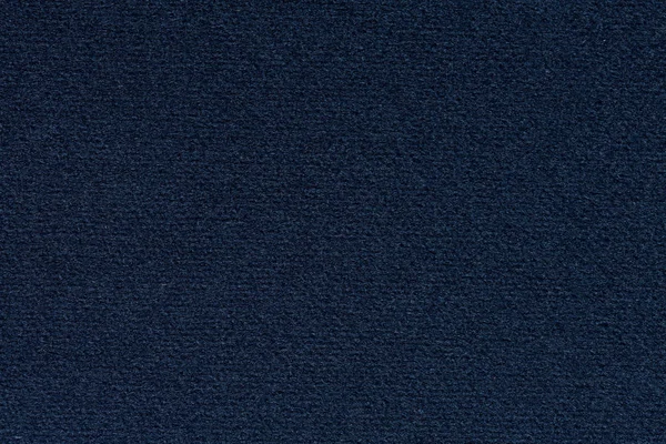 Textura del material en su color azul oscuro ideal. Se puede utilizar para plantillas web, obras de arte . — Foto de Stock