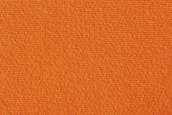 Orange paper with pattern. Can be used as texture in art projects.