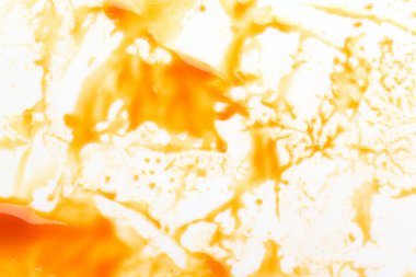 Esmer şeker şurubu damlaları, karamel yakın plan..