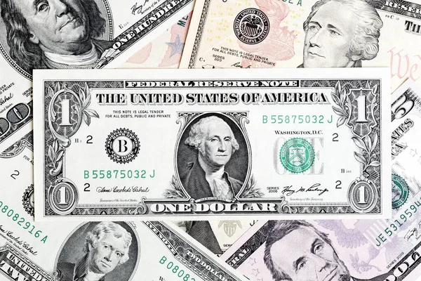 One dollar bill close-up on money background. — Stock Photo, Image