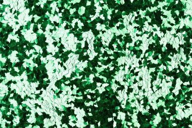 Tasarımınız için yeni yeşil tonda parlak holografik sim arkaplanı.