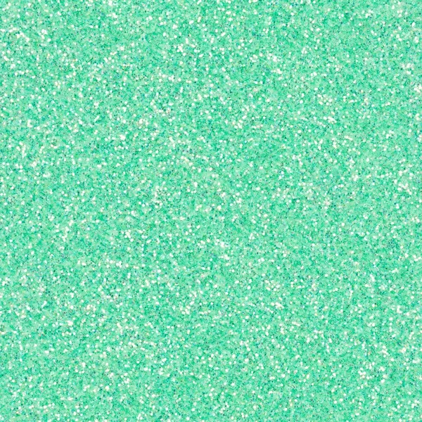 Elegant light green glitter, sparkle confetti texture. Christmas abstract background, seamless pattern.