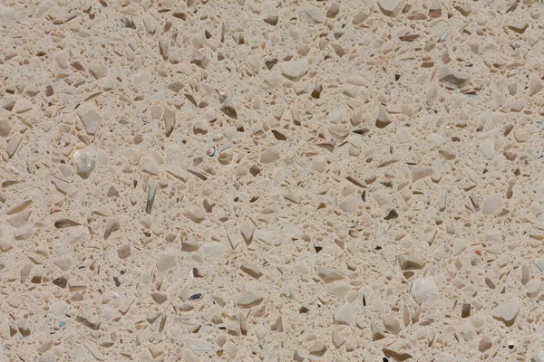 Stylish light beige synthetic rock background close-up. — Stock Photo, Image