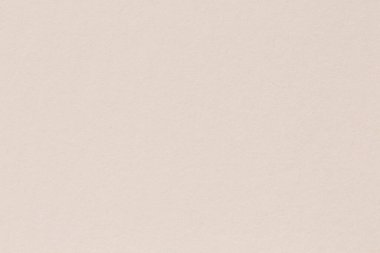 Kağıt dokusu arka plan açık krem rengi, makro çekim.