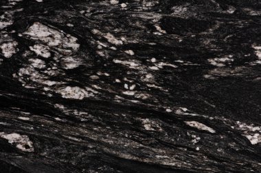 Unique Cosmic Black - granite background, photo of slab texture in dark tone for your creative design work.