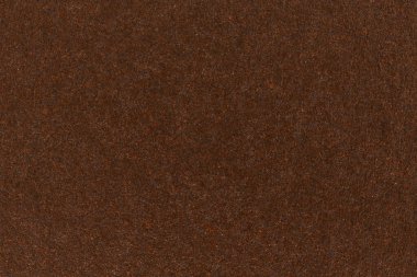 Koyu kahverengi kağıt arka plan ve dokulu. Yüksek çözünürlüklü fotoğraf.