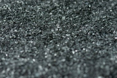 Hindistan cevizi kömür dokusu, bulanık arkaplan ve önplan yatay