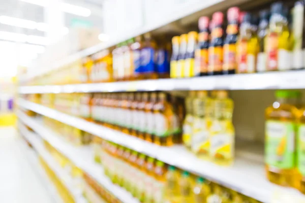 Blur Supermarket sale cooking oil bottles on shelves