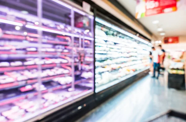 Blur grocery store supermarket aisle shelves chilled zone background