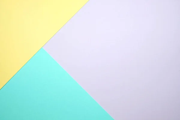 Moda pastel kağıt düz renkli yatıyordu üstten görünüm, geometrik arka plan dokusu, pembe, mor, sarı, bej, yeşil ve mavi renk.