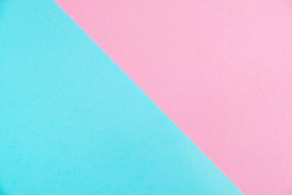 Пастельно окрашенная бумага плоский вид сверху, текстура фона, розовый и голубой цвет
.
