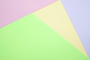 Moda pastel kağıt düz renkli yatıyordu üstten görünüm, geometrik arka plan dokusu, pembe, mor, sarı, bej, yeşil ve mavi renk.