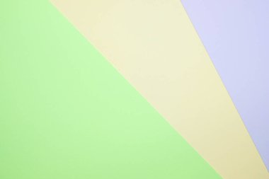 Moda pastel kağıt düz renkli yatıyordu üstten görünüm, geometrik arka plan dokusu, pembe, mor, sarı, bej, yeşil ve mavi renk.